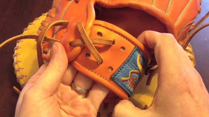 Tightenig Laces To Show How to Stiffen Up A Baseball Glove