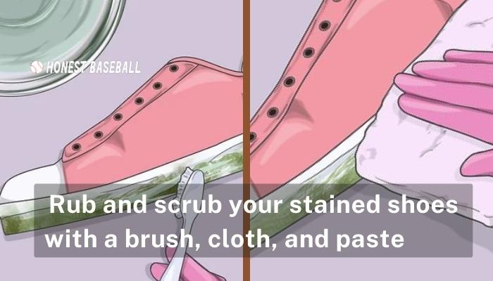 Rub and scrub your stained shoes with a brush, cloth, and paste