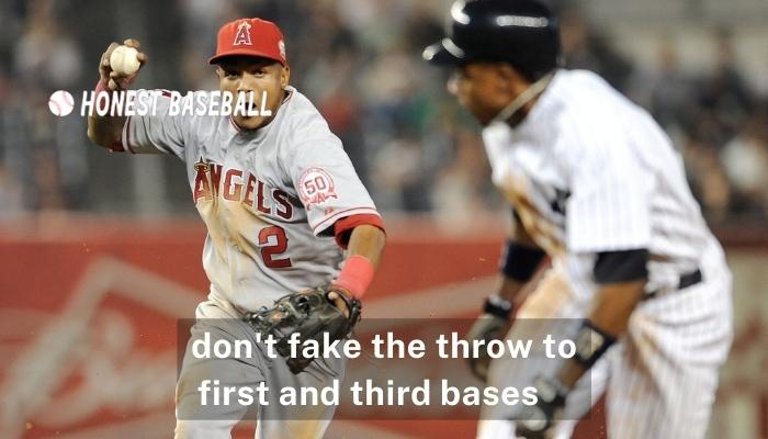 don't fake the throw to first and third bases