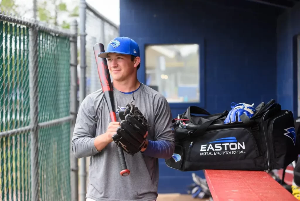 A baseball ball player with easton bag