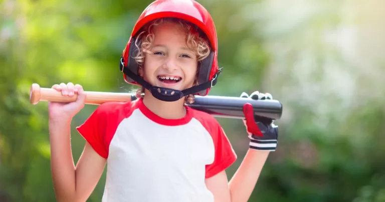 a boy with baseball bat