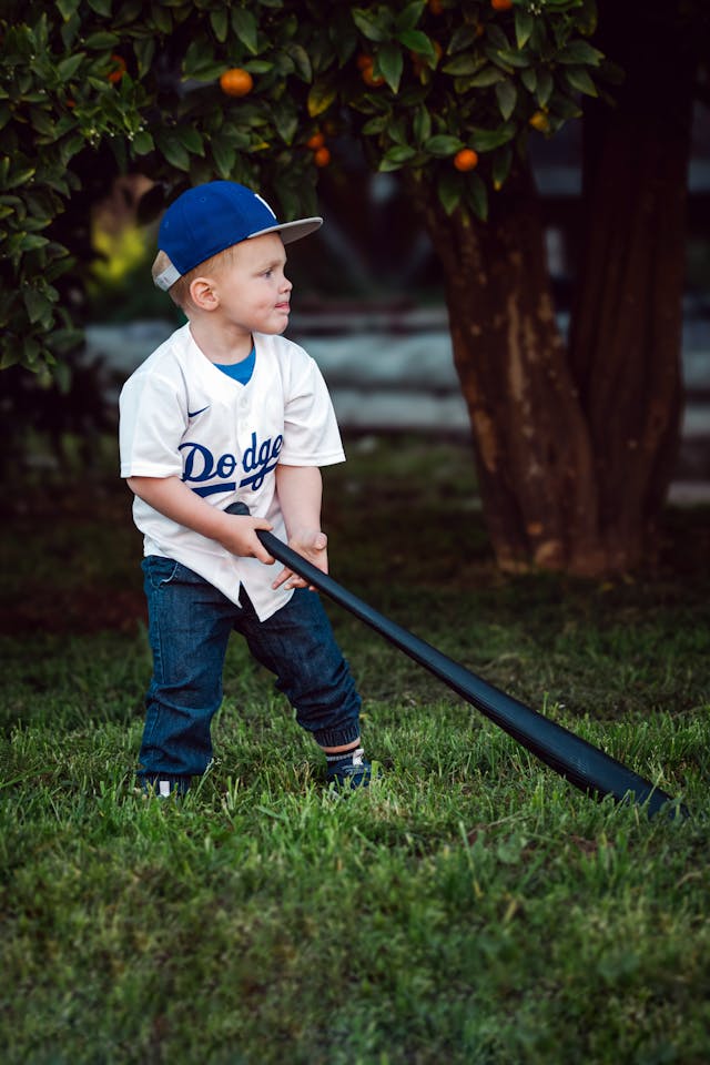 A baby with baseball bat 