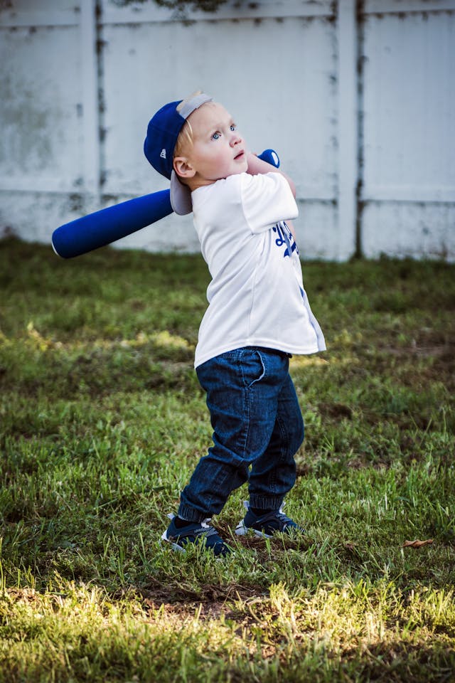 A boy with baesball bat