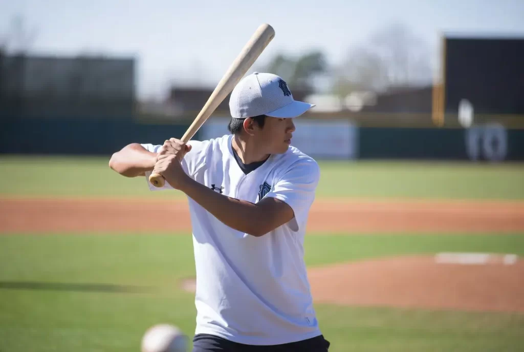 A baseball player with Warm-up Drill on baseball field